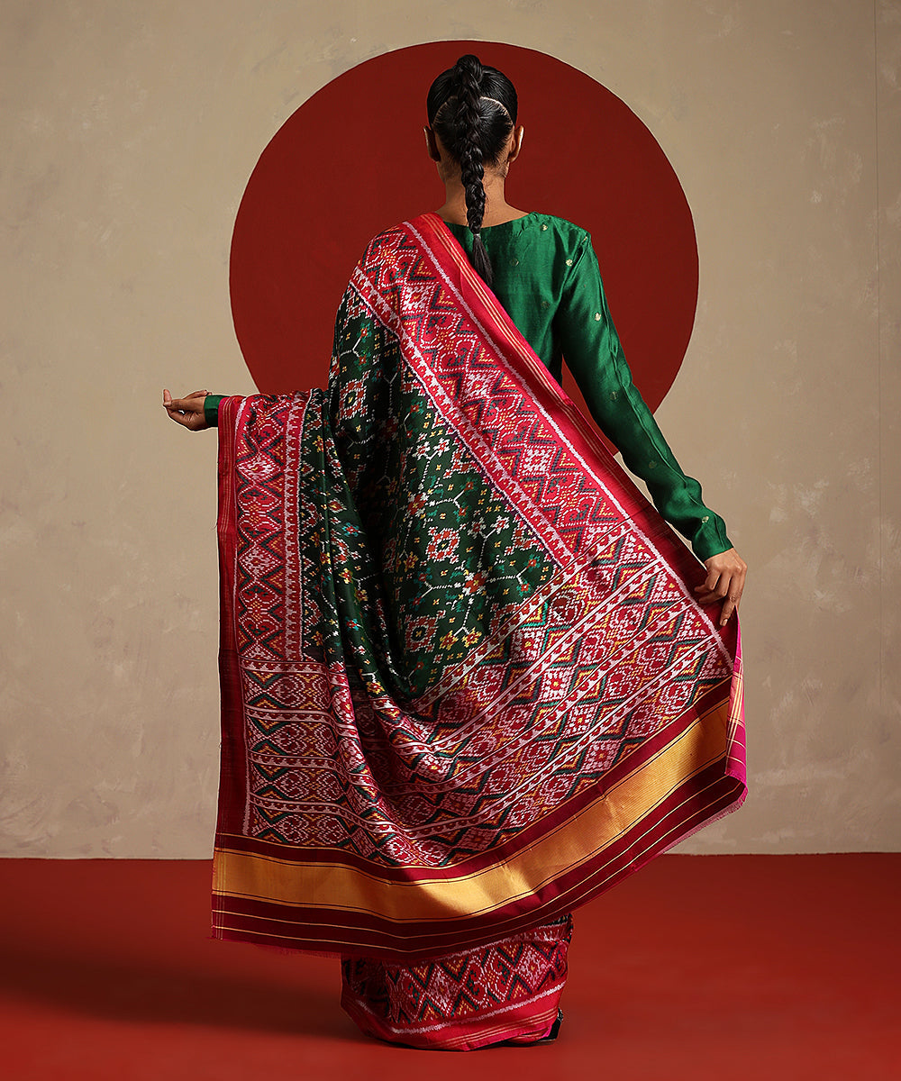 Handloom_Green_And_Hot_Pink_Pure_Mulberry_Silk_Ikat_Patola_Saree_WeaverStory_03
