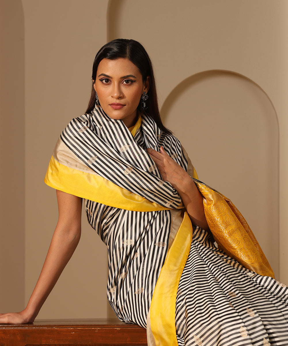 White_And_Black_Handloom_Mashroo_Silk_Banarasi_Saree_With_Yellow_And_Grey_Border_WeaverStory_01