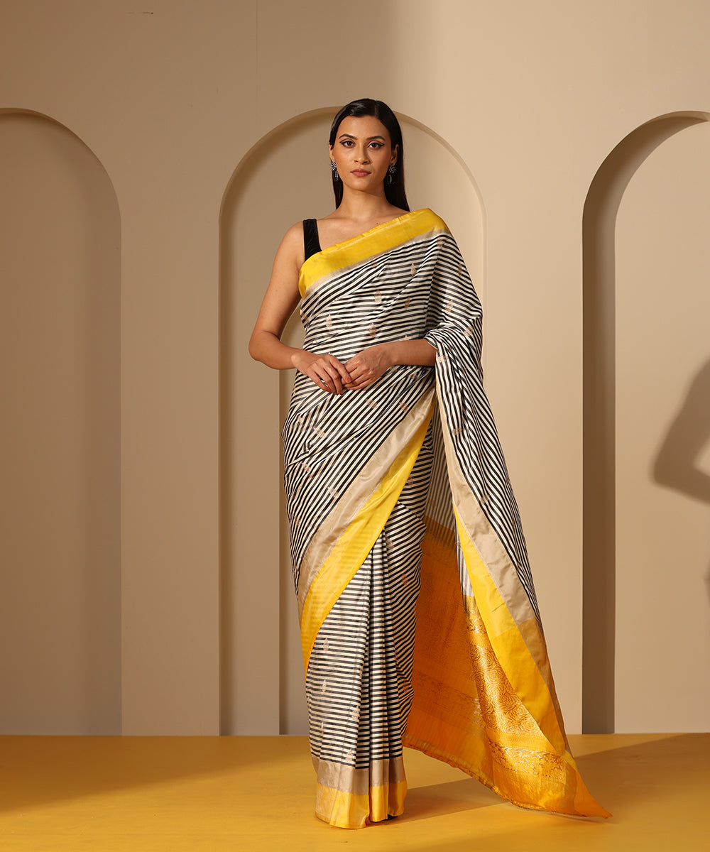 White_And_Black_Handloom_Mashroo_Silk_Banarasi_Saree_With_Yellow_And_Grey_Border_WeaverStory_02