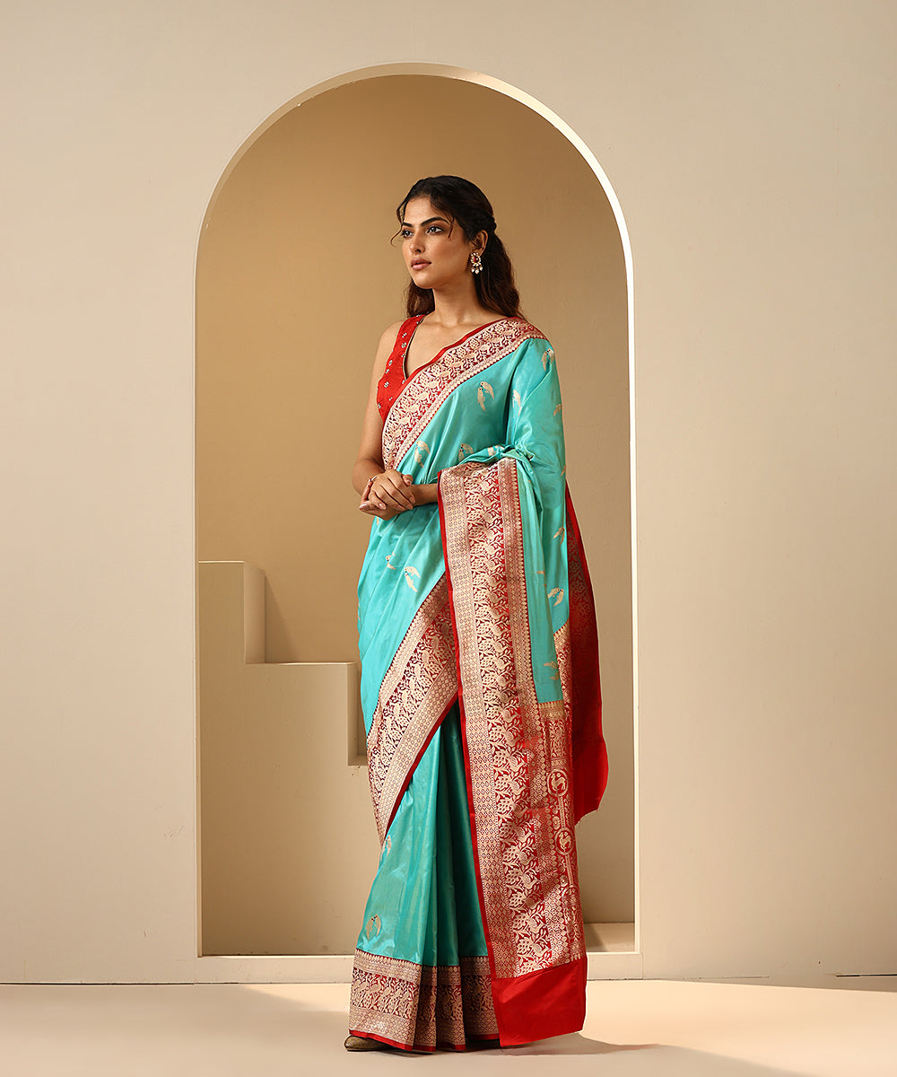 Aqua_Handloom_Pure_Katan_Silk_Banarasi_Saree_With_Red_Shikargah_Border_WeaverStory_02
