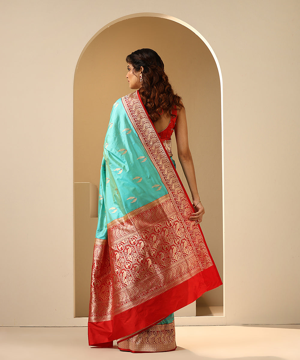 Aqua_Handloom_Pure_Katan_Silk_Banarasi_Saree_With_Red_Shikargah_Border_WeaverStory_03