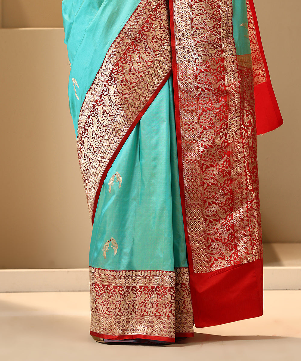 Aqua_Handloom_Pure_Katan_Silk_Banarasi_Saree_With_Red_Shikargah_Border_WeaverStory_04