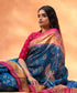Turquoise_Blue_And_Pink_Handloom_Pure_Mulberry_Silk_Ikat_Patola_Saree_With_Zari_Border_WeaverStory_01