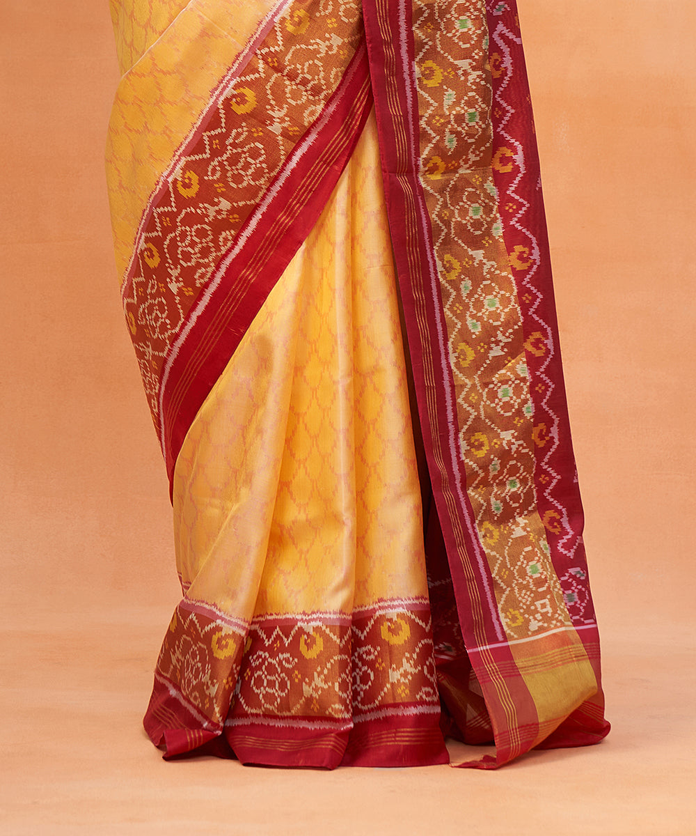 Yellow_And_Red_Handloom_Pure_Mulberry_Silk_Ikat_Patola_Saree_With_Zari_Border_WeaverStory_04