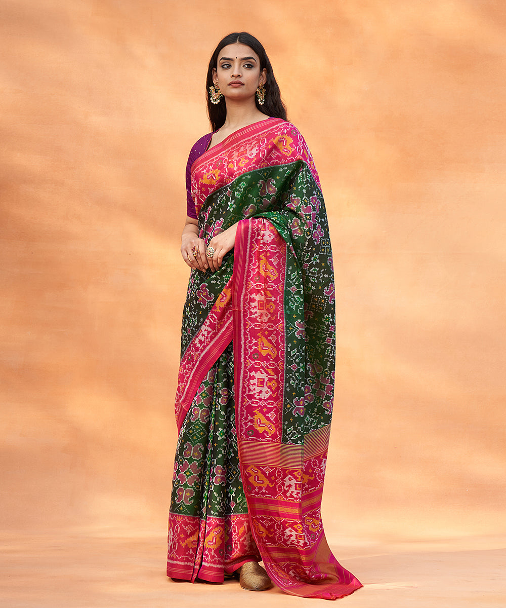 Handloom_Green_And_Magenta_Pure_Mulberry_Silk_Ikat_Patola_Saree_With_Elephants_On_Pallu_WeaverStory_02