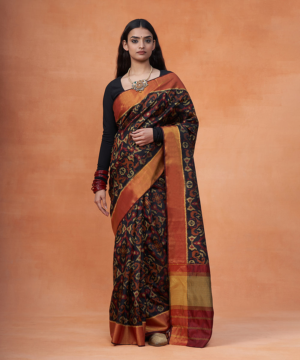 Handloom_Black_And_Maroon_Pure_Mulberry_Silk_Ikat_Patola_Saree_With_Zari_Border_WeaverStory_02