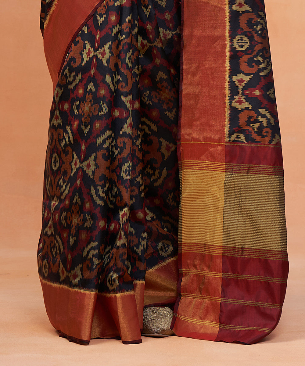 Handloom_Black_And_Maroon_Pure_Mulberry_Silk_Ikat_Patola_Saree_With_Zari_Border_WeaverStory_04