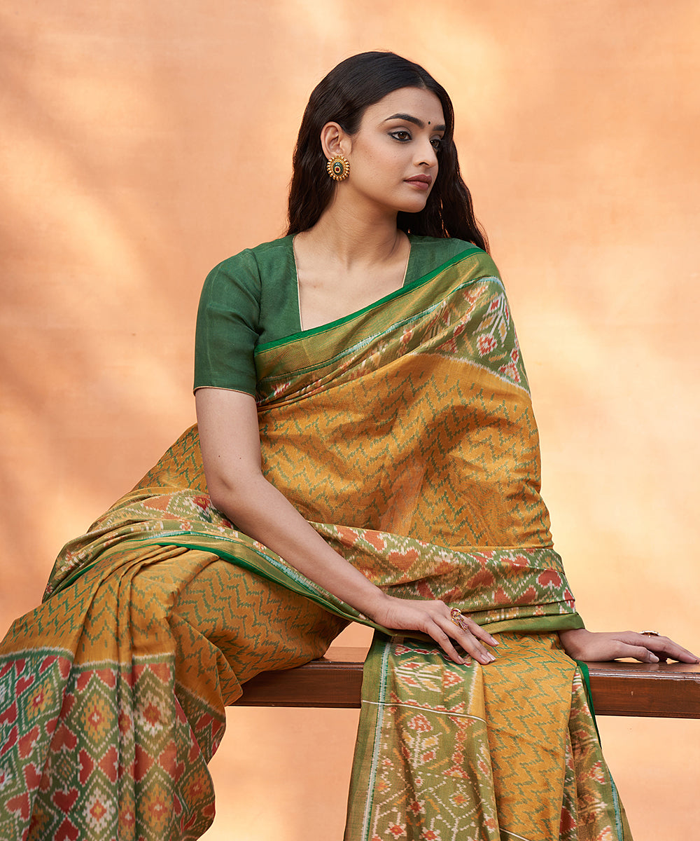 Green_And_Mustard_Handloom_Pure_Mulberry_Tissue_Patola_Saree_WeaverStory_01