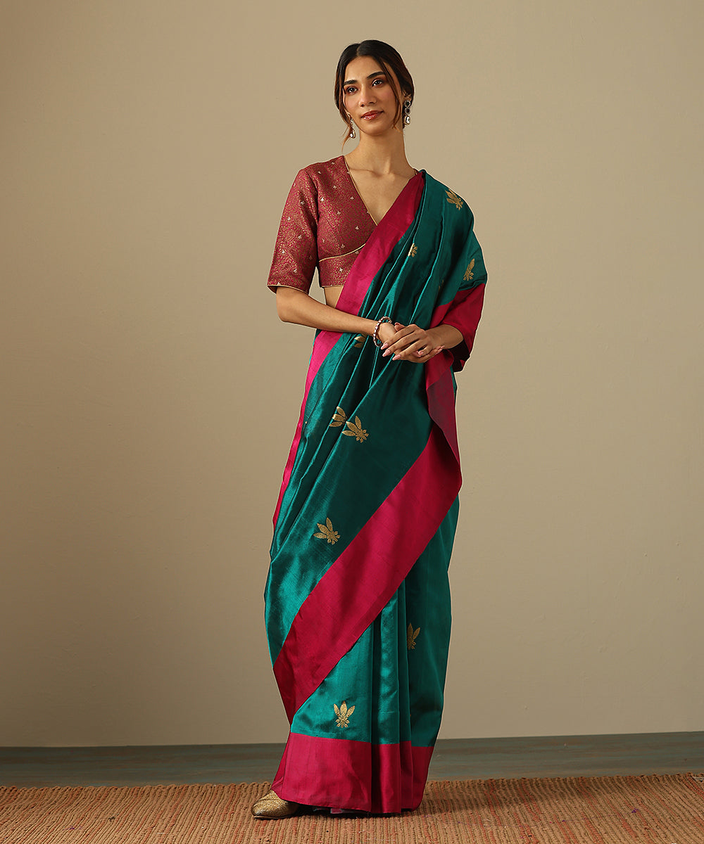 Teal_Handloom_Pure_Chanderi_Silk_Saree_With_Floral_Motifs_And_Pink_Mashroo_Border_WeaverStory_02
