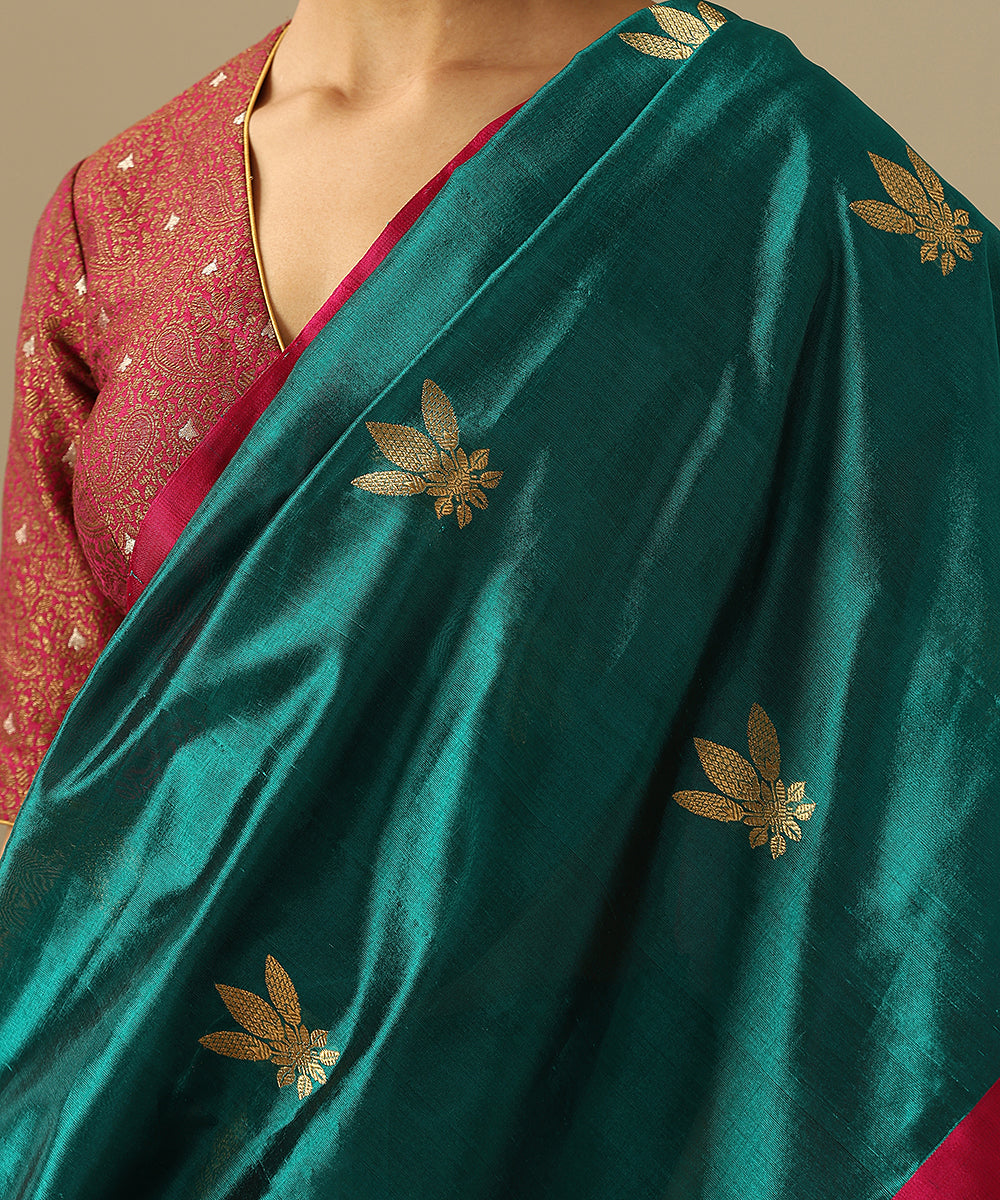 Teal_Handloom_Pure_Chanderi_Silk_Saree_With_Floral_Motifs_And_Pink_Mashroo_Border_WeaverStory_04