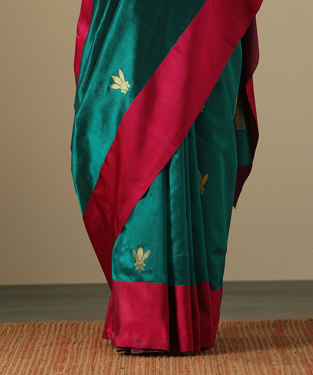Teal_Handloom_Pure_Chanderi_Silk_Saree_With_Floral_Motifs_And_Pink_Mashroo_Border_WeaverStory_05