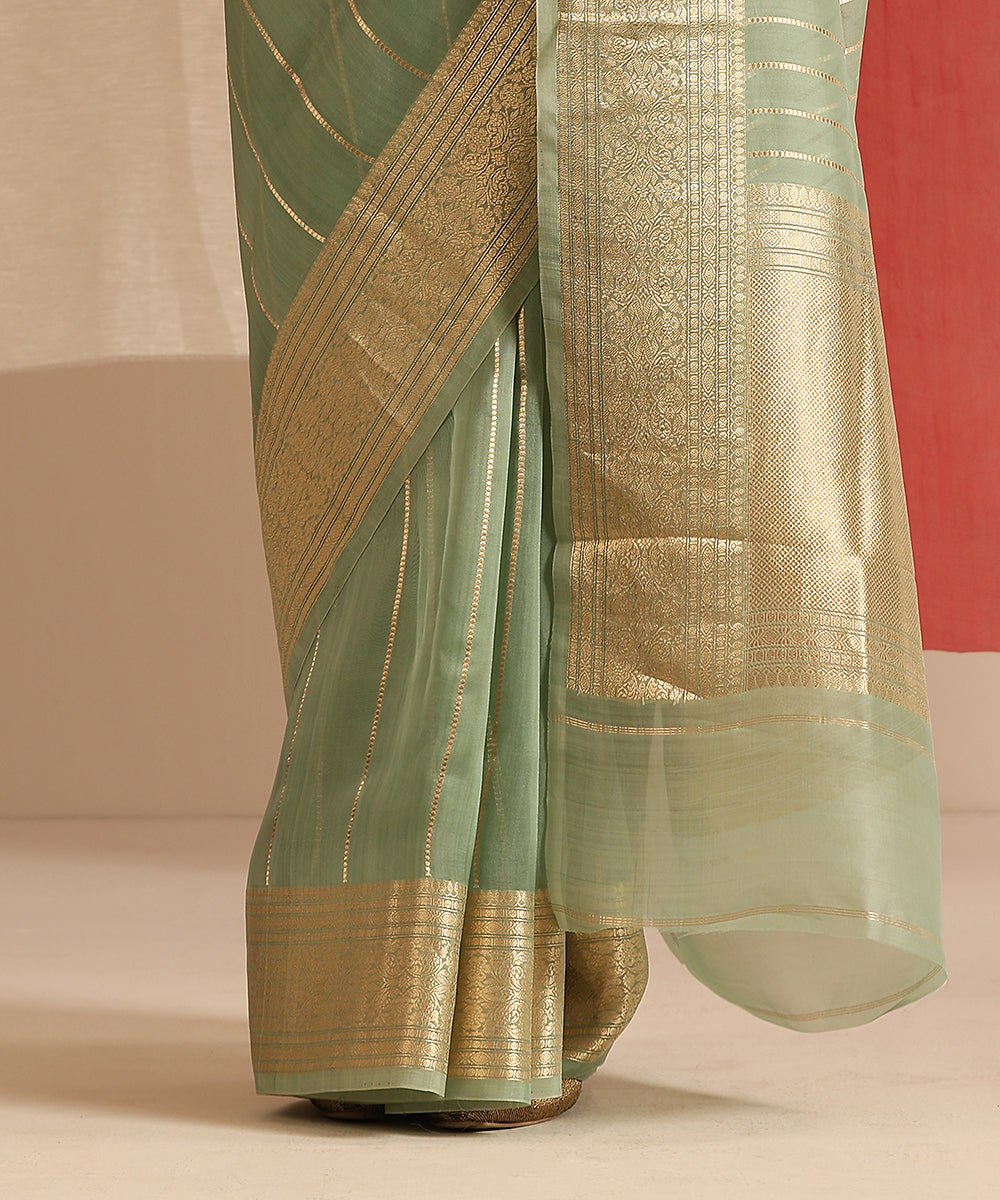 Handloom_Sage_Green_Pure_Kora_Silk_Banarasi_Saree_With_Gold_Zari_Stripes_And_Kadhwa_Border_WeaverStory_04
