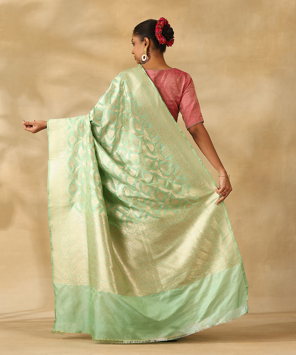 Sea_Green_Handloom_Pure_Katan_Silk_Banarasi_Saree_With_All_Over_Zari_Jaal_In_Cutwork_Weave_WeaverStory_03