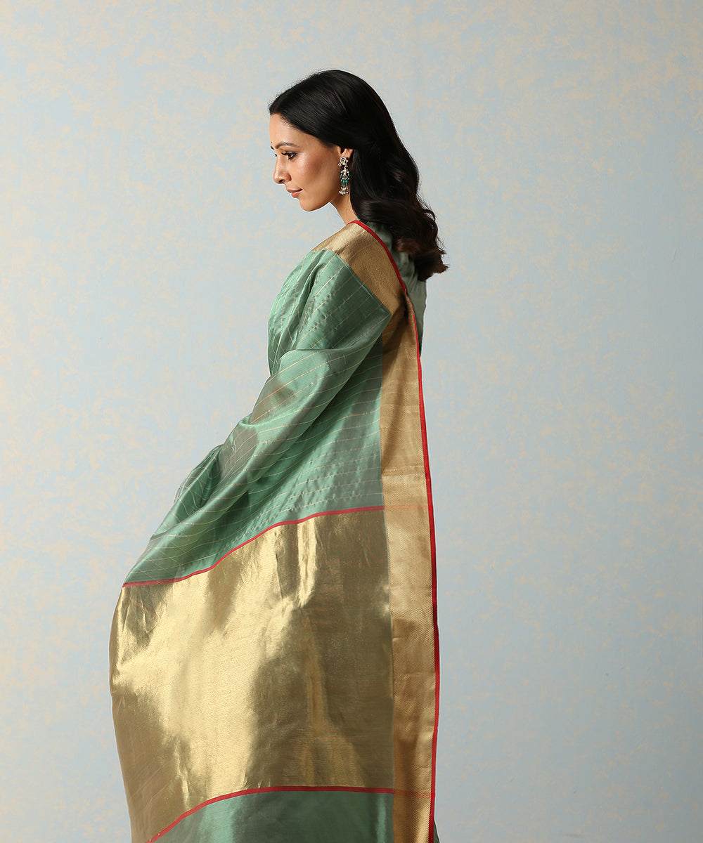 Handloom_Green_Striped_Silk_Chanderi_Saree_With_Gold_Border_WeaverStory_01