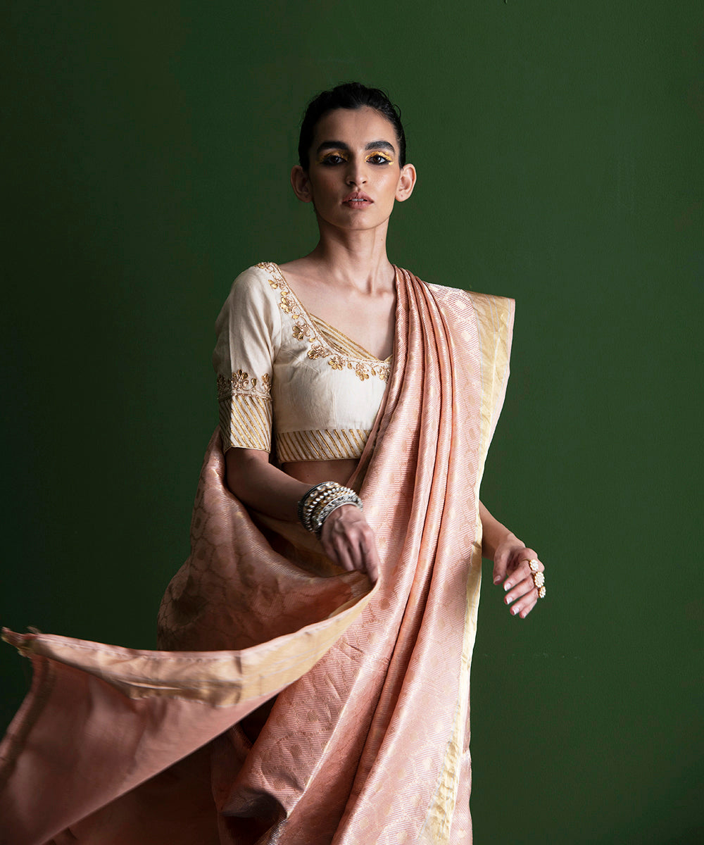 Peach_Handloom_Pure_Katan_Silk_Tanchoi_Banarasi_Saree_with_Over_All_Zari_WeaverStory_01