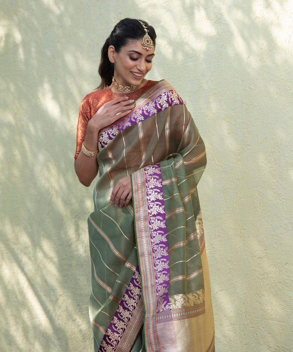 Handloom_Green_Kora_Banarasi_Saree_With_Kadhwa_Zari_Stripes_And_Purple_Floral_Border_WeaverStory_01