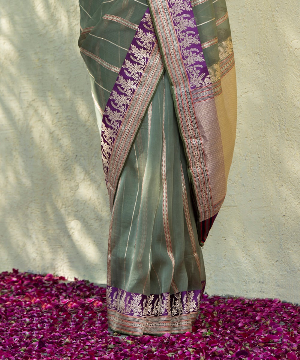 Handloom_Green_Kora_Banarasi_Saree_With_Kadhwa_Zari_Stripes_And_Purple_Floral_Border_WeaverStory_04