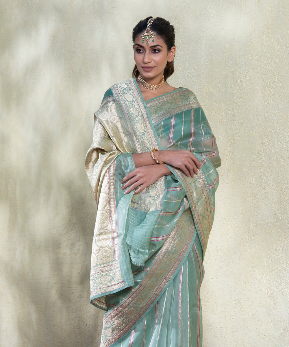 Light_Blue_Handloom_Kora_Silk_Banarasi_Saree_With_Zari_Stripes_And_Floral_Border_WeaverStory_01