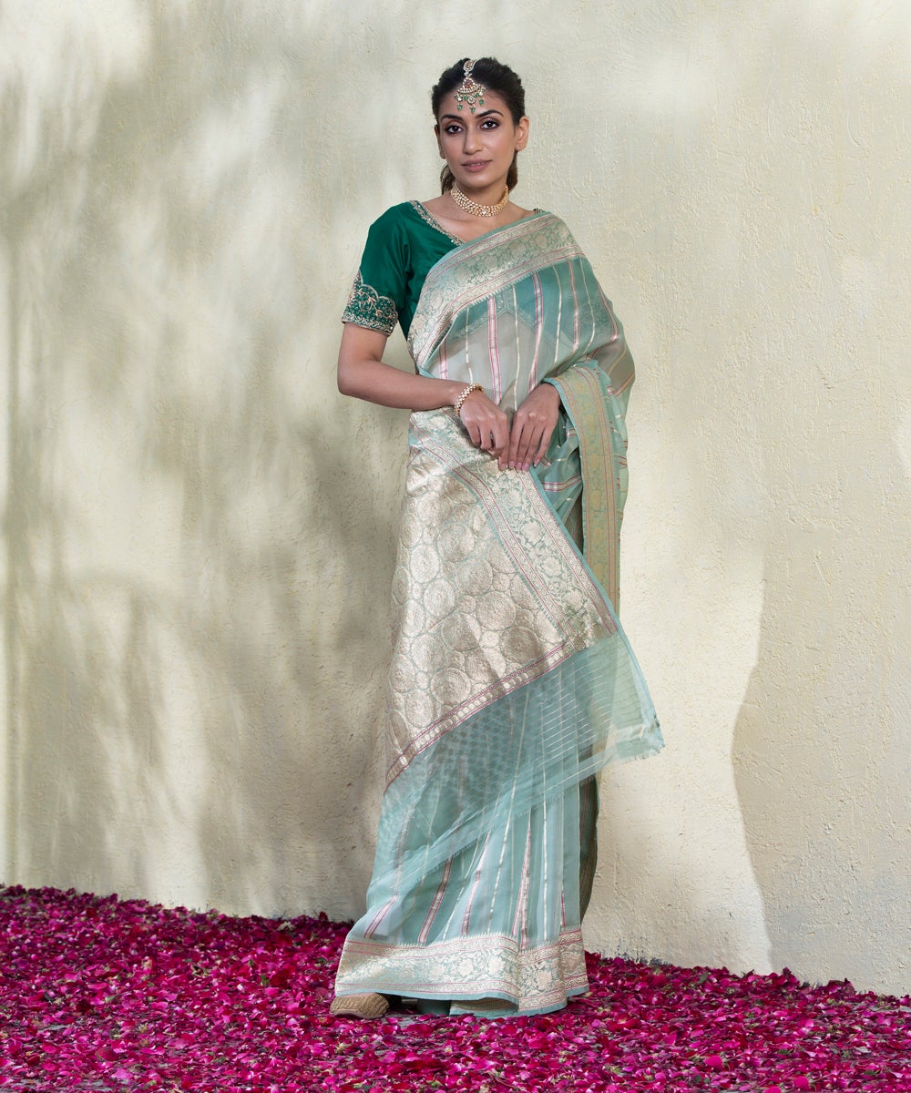 Light_Blue_Handloom_Kora_Silk_Banarasi_Saree_With_Zari_Stripes_And_Floral_Border_WeaverStory_02