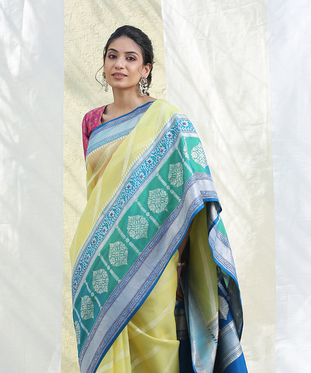 Yellow_Handloom_Kora_Silk_Banarasi_Saree_With_Peacock_Blue_Broad_Border_WeaverStory_01