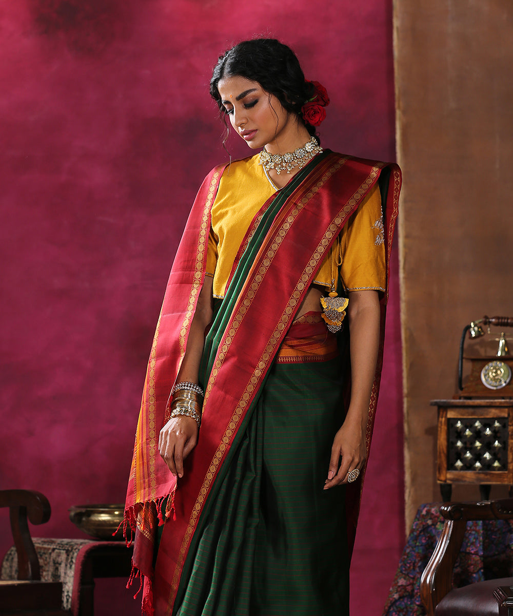 Green_Striped_Handloom_Pure_Silk_Kanjivaram_Saree_With_Maroon_Thread_Border_WeaverStory_01