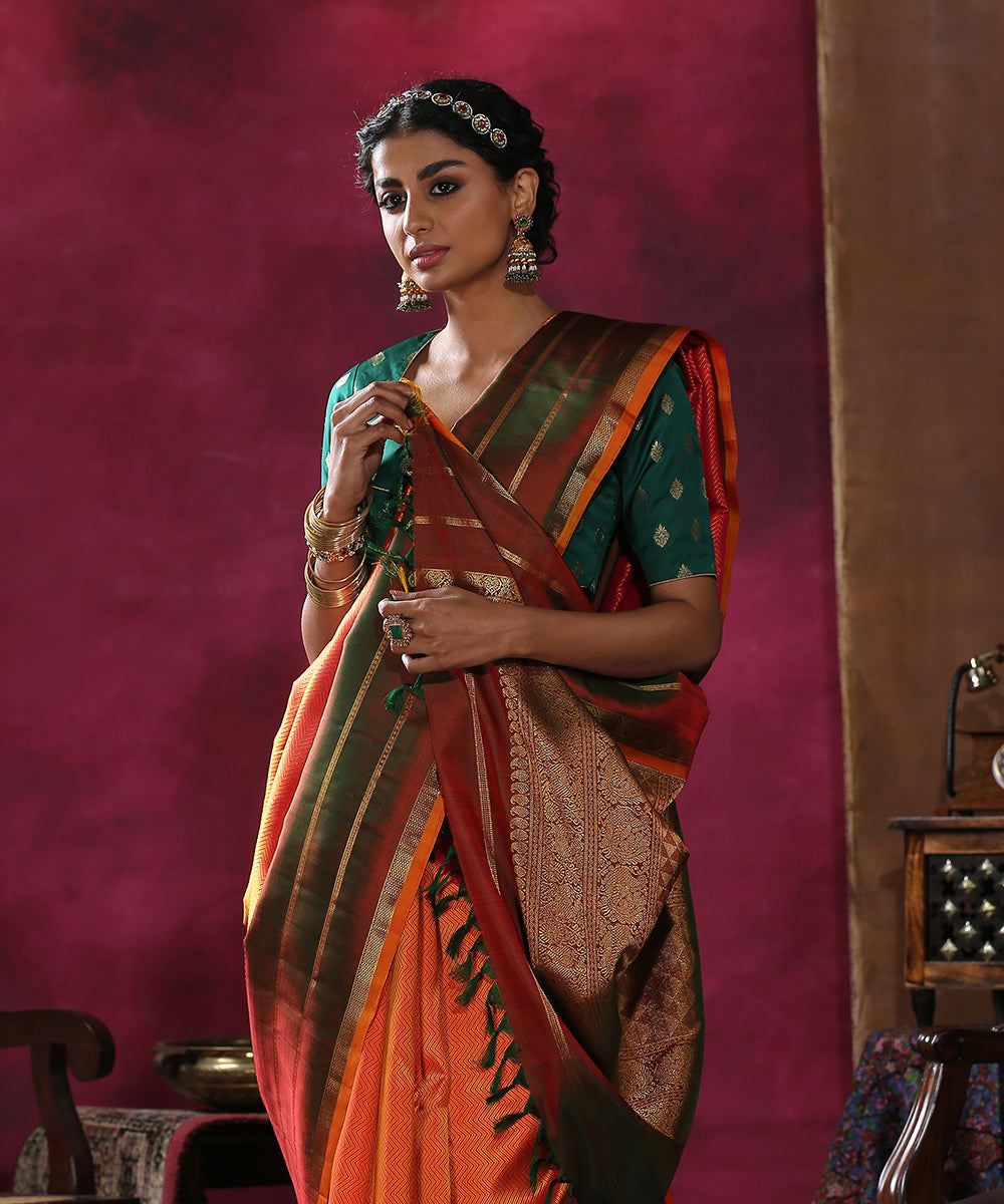 Red_And_Orange_Handloom_Chevron_Jacquard_Pure_Silk_Kanjivaram_Saree_With_Green_And_Orange_Border_WeaverStory_01