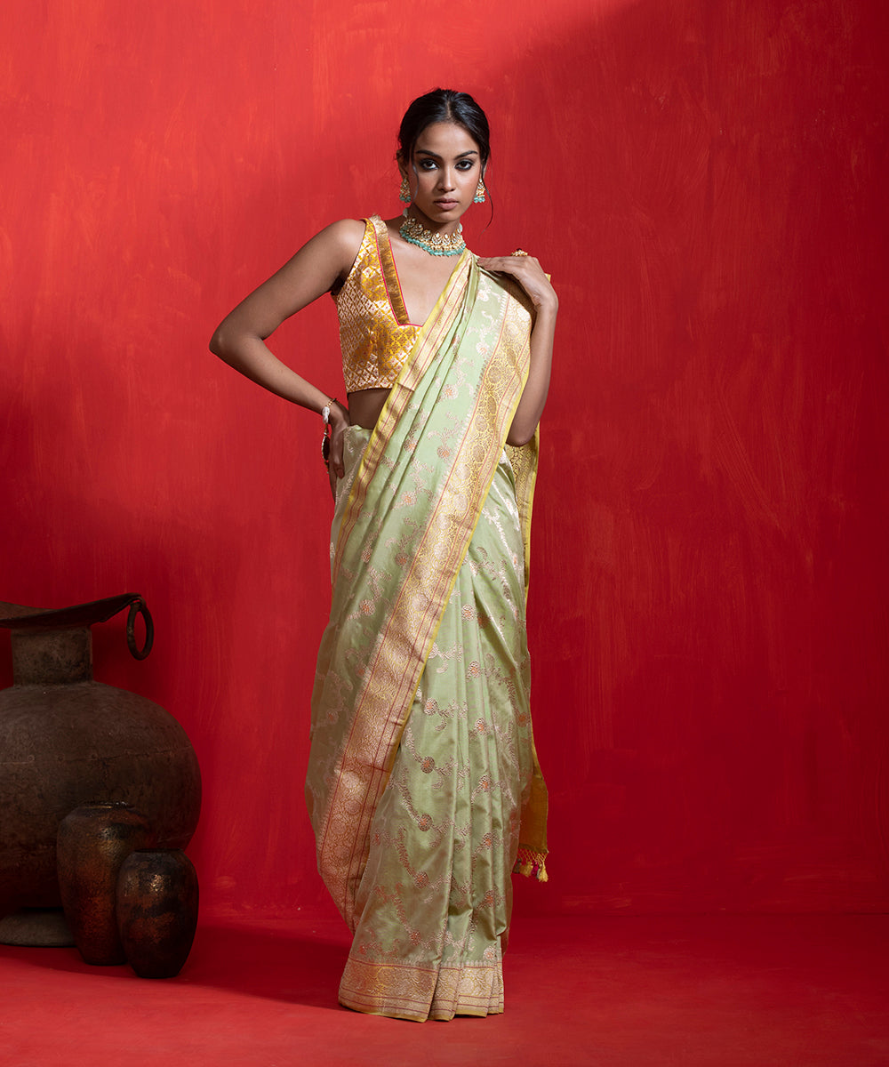 Pista_Green_Handloom_Pure_Katan_Silk_Banarasi_Saree_With_Meenakari_And_Kadhiyal_Yellow_Border_WeaverStory_02