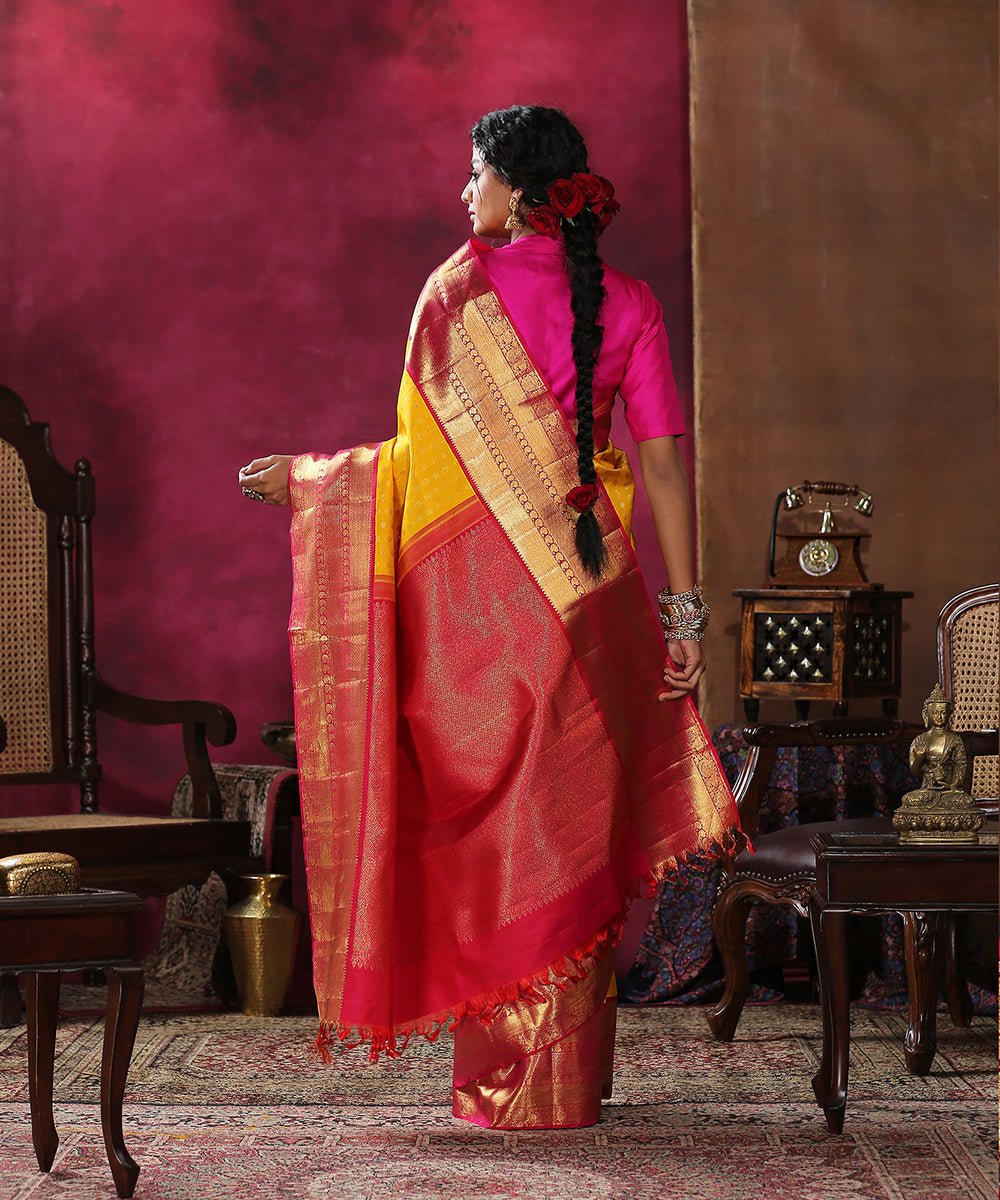 Handloom_Yellow_Pure_Silk_Kanjivaram_Saree_With_Pink_And_Gold_Broad_Borders_WeaverStory_03