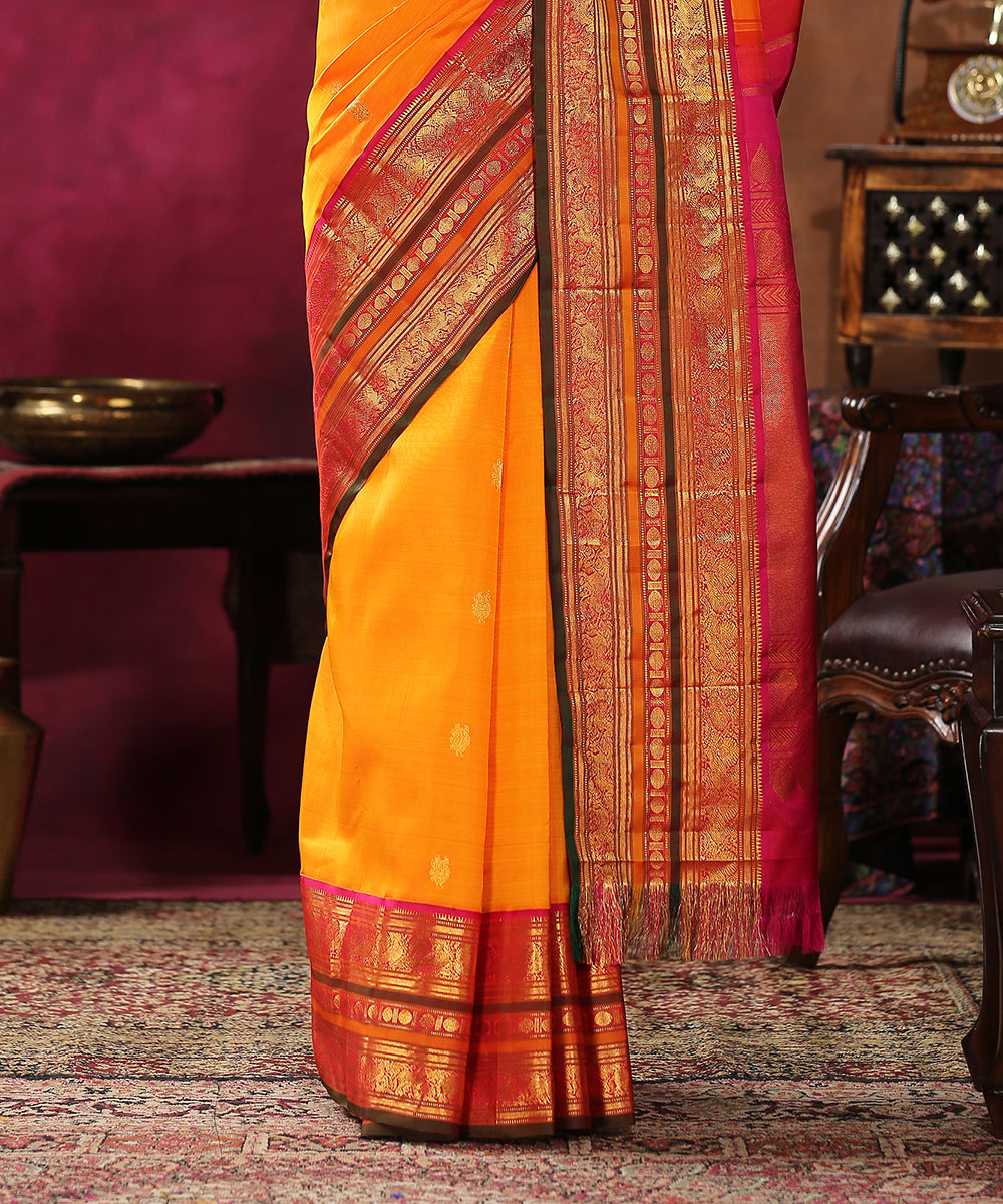 Handloom_Orange_Pure_Silk_Kanjivaram_Saree_With_Pink_And_Green_Border_WeaverStory_04
