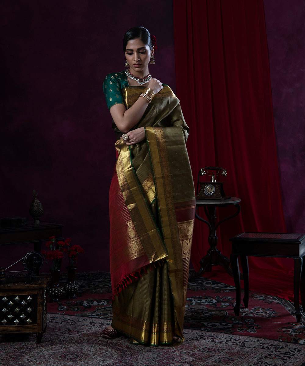 Olive_Green_Handloom_Pure_Zari_and_Silk_Kanjivaram_Saree_With_Annapakshi_Border_WeaverStory_02