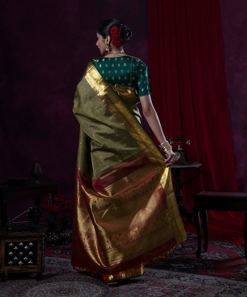 Olive_Green_Handloom_Pure_Zari_and_Silk_Kanjivaram_Saree_With_Annapakshi_Border_WeaverStory_03