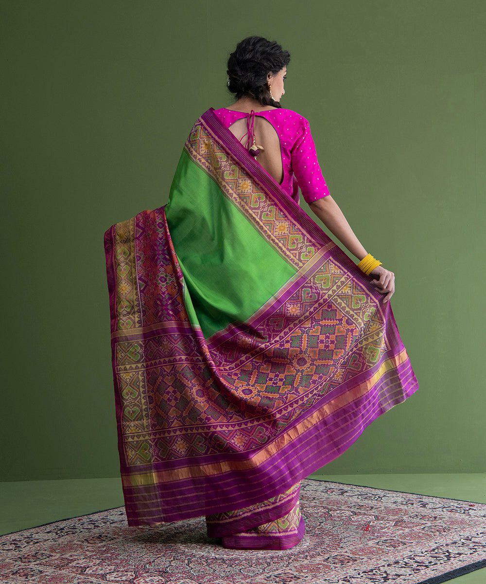Handloom_Green_Single_Ikat_Mulberry_Silk_Patola_Saree_With_Purple_Border_WeaverStory_03