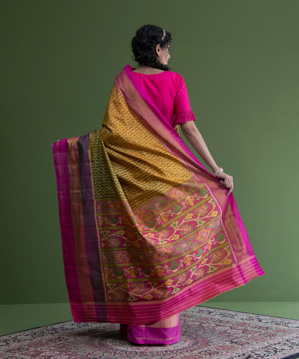 Yellow_And_Green_Handloom_Single_Ikat_Mulberry_Silk_Patola_Saree_With_Pink_Border_WeaverStory_03