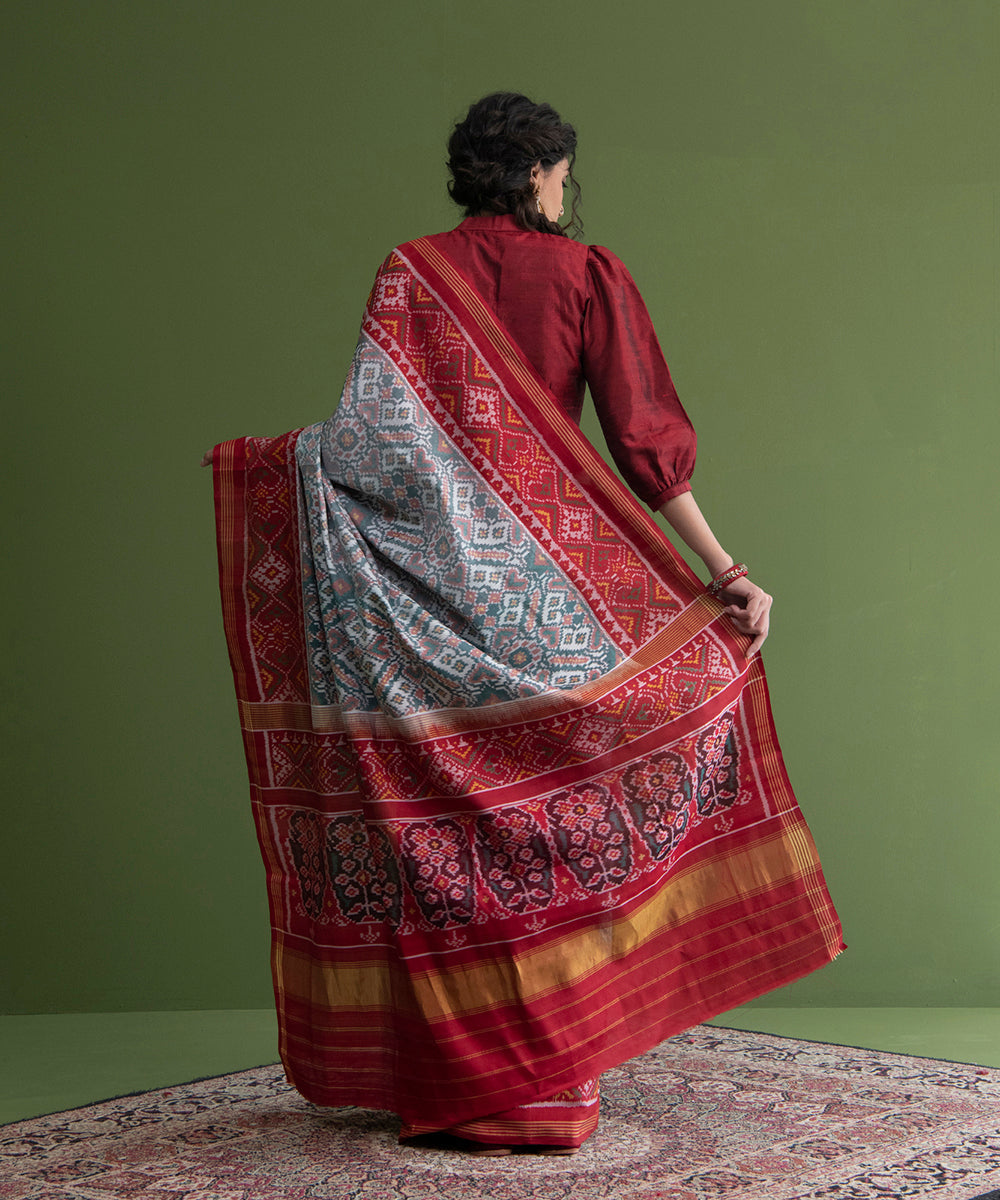 White_And_Red_Handloom_Single_Ikat_Weft_Dyed_8_Ply_Mulberry_Silk_Patola_Saree_WeaverStory_03