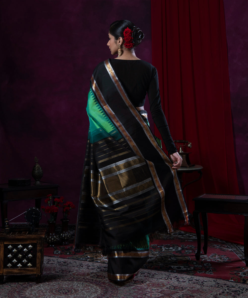 Sap_Green_Handloom_Pure_Silk_Kanjivaram_Saree_With_Black_Temple_Border_WeaverStory_03