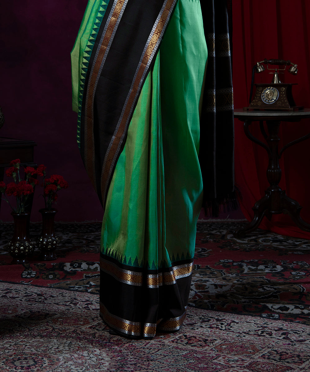 Sap_Green_Handloom_Pure_Silk_Kanjivaram_Saree_With_Black_Temple_Border_WeaverStory_04