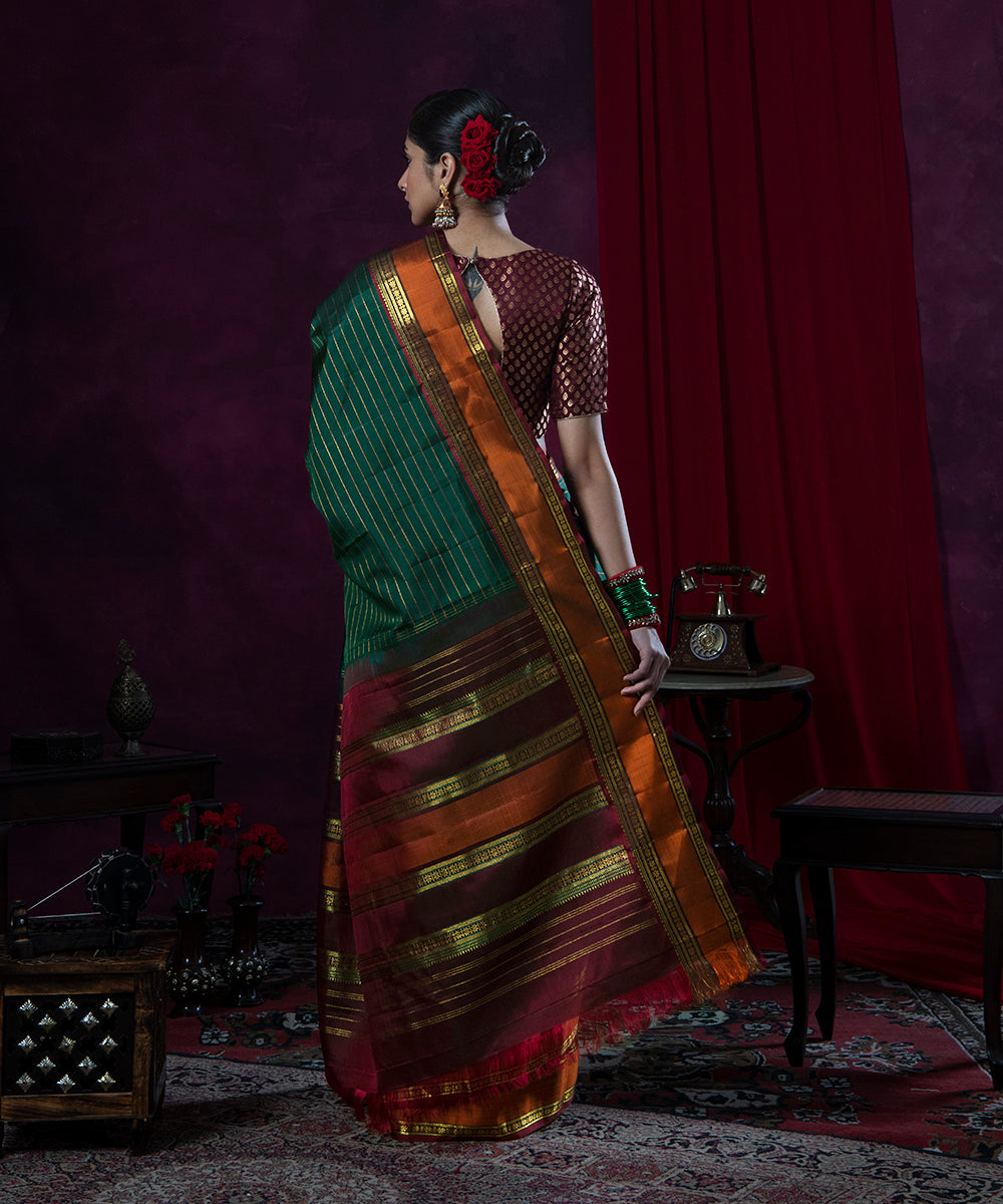 Handloom_Emerald_Green_Striped_Pure_Silk_Kanjivaram_Saree_With_Rust_Border_WeaverStory_03