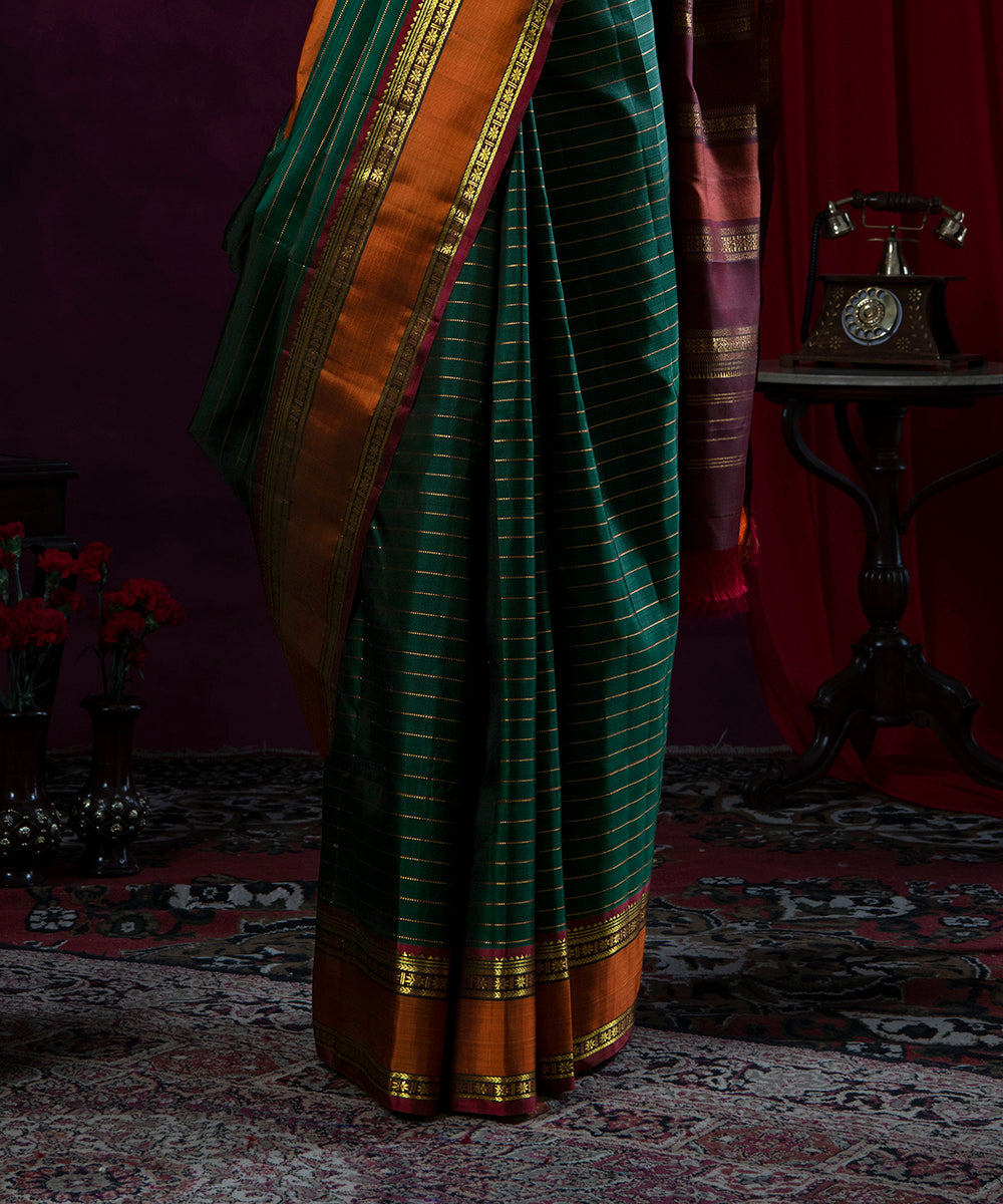Handloom_Emerald_Green_Striped_Pure_Silk_Kanjivaram_Saree_With_Rust_Border_WeaverStory_04