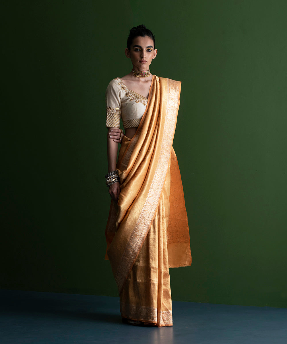 Handloom_Soft_Peachy_Orange_Pure_Katan_Silk_Tanchoi_Banarasi_Saree_with_Kadhwa_Border_WeaverStory_02