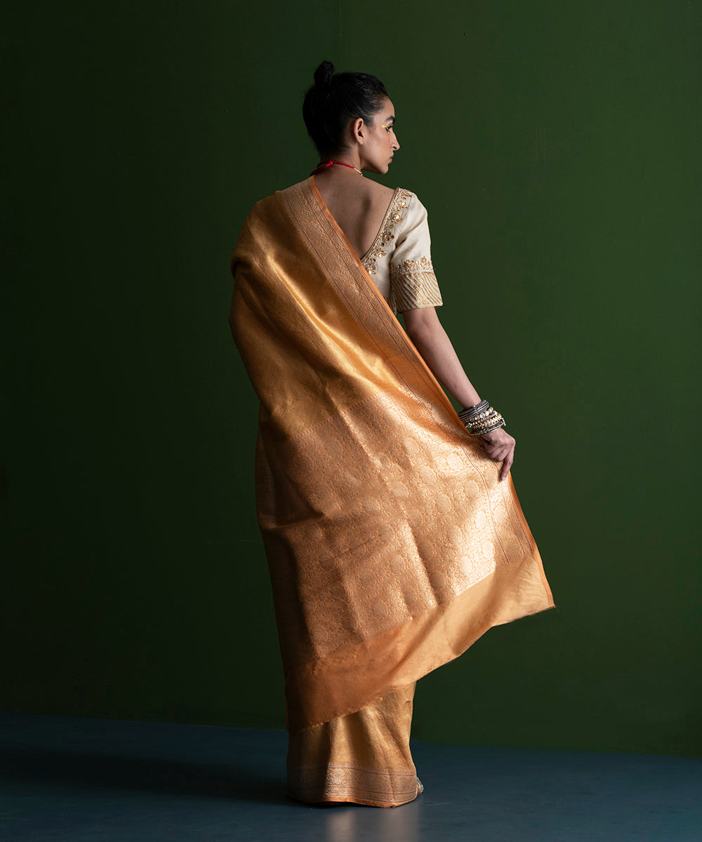 Handloom_Soft_Peachy_Orange_Pure_Katan_Silk_Tanchoi_Banarasi_Saree_with_Kadhwa_Border_WeaverStory_03