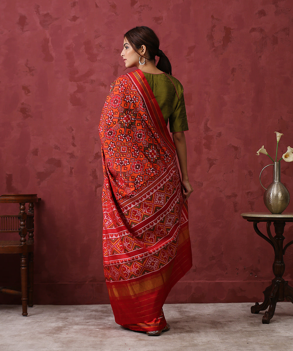 Handloom_Orange_8_Ply_Mulberry_Silk_Patola_Saree_With_Red_Border_And_Pallu_WeaverStory_03