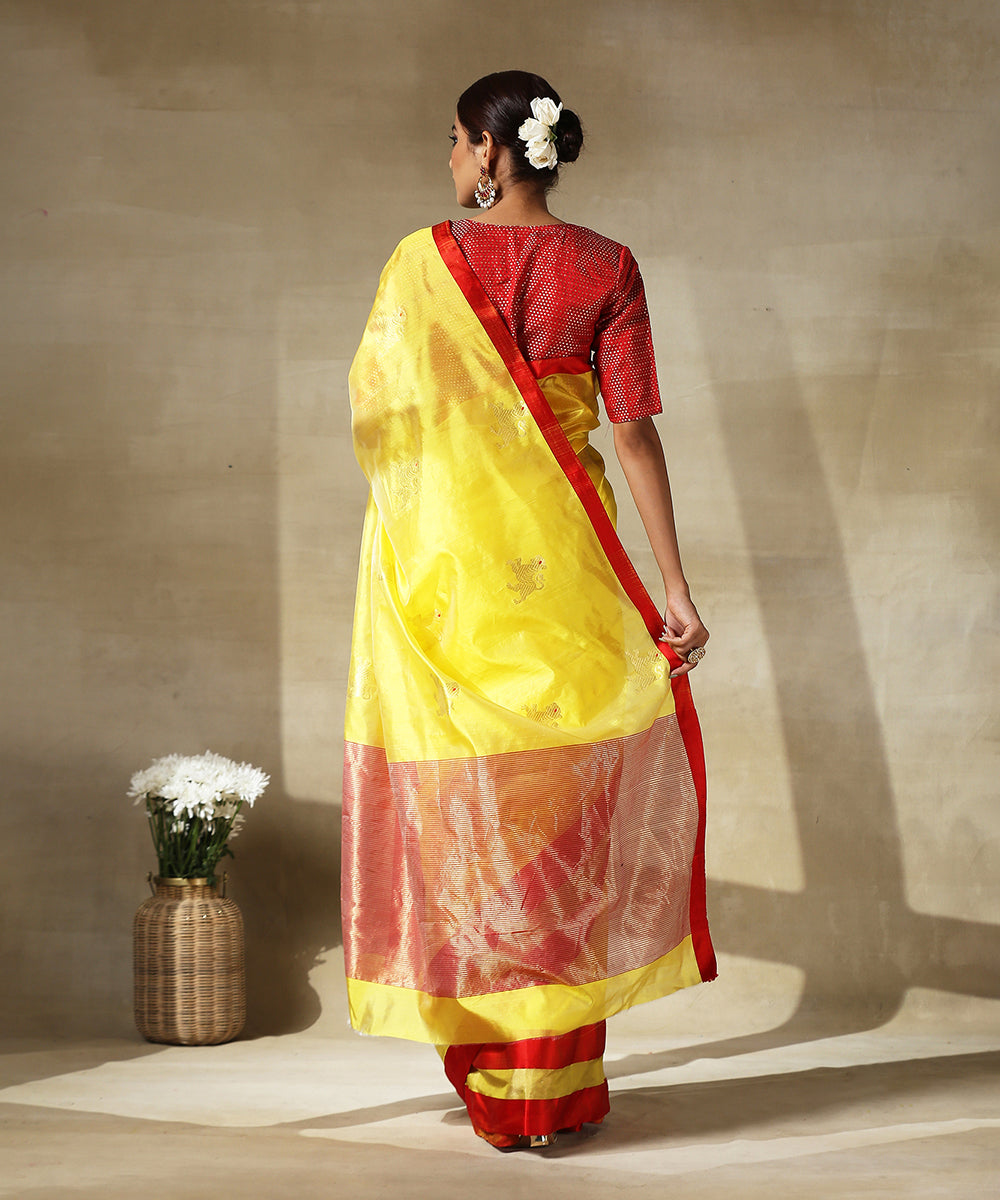 Yellow_Handloom_Chanderi_Silk_Saree_With_Eknaliya_Lion_Motifs_And_Red_Mashroo_Border_WeaverStory_03