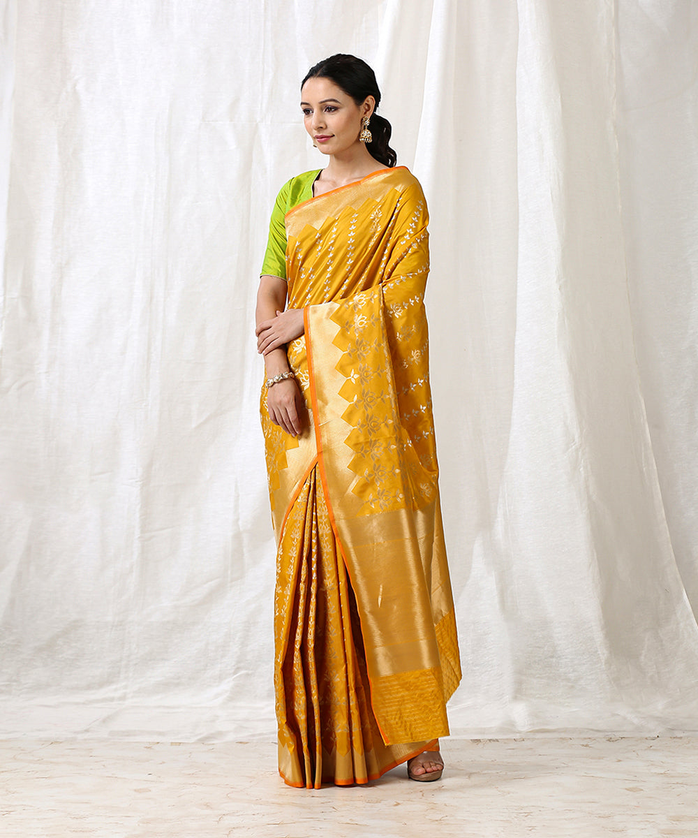 Handloom_Mustard_Pure_Katan_Silk_Banarasi_Saree_With_Lotus_Motifs_Woven_Vertically_WeaverStory_02