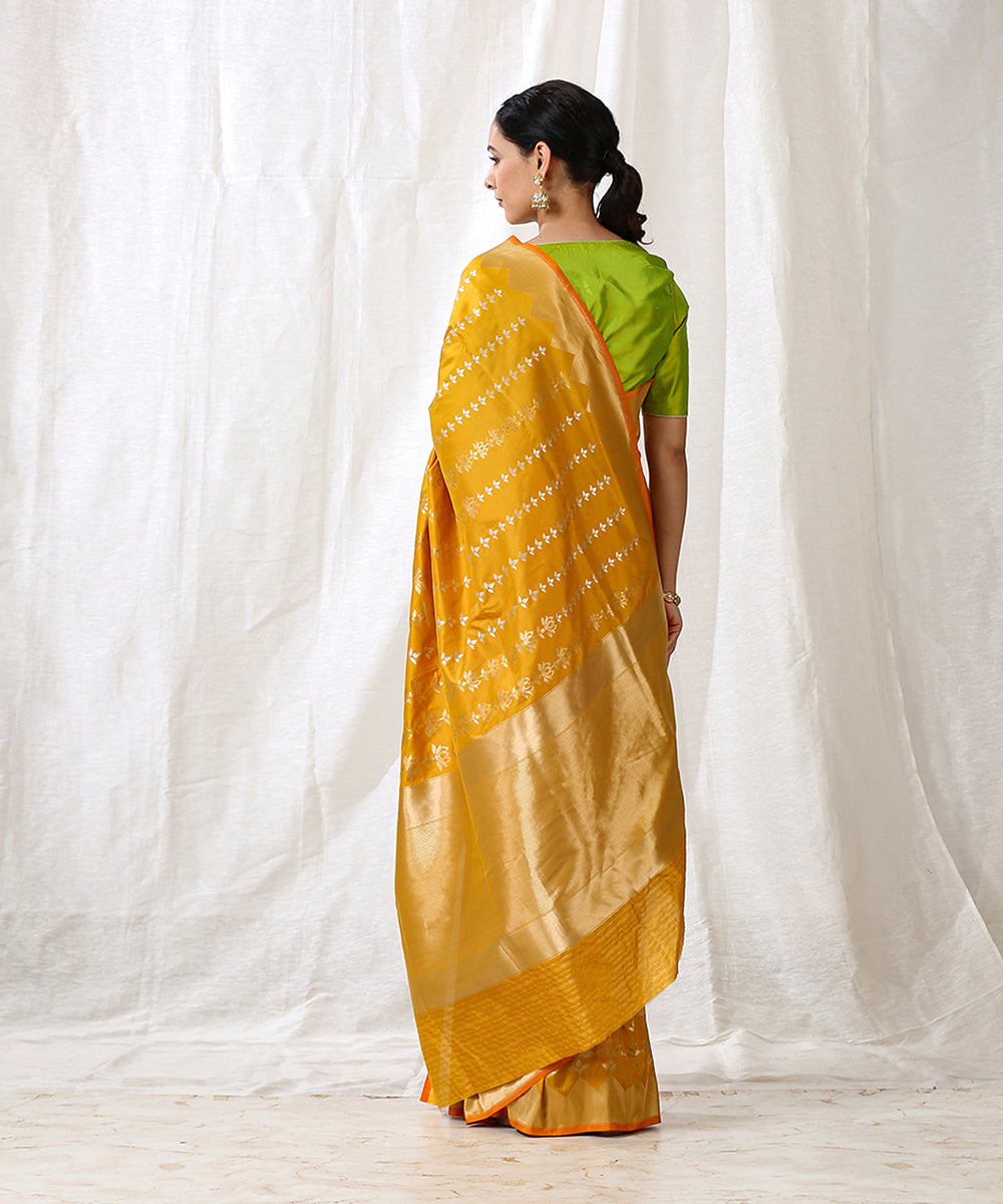 Handloom_Mustard_Pure_Katan_Silk_Banarasi_Saree_With_Lotus_Motifs_Woven_Vertically_WeaverStory_03