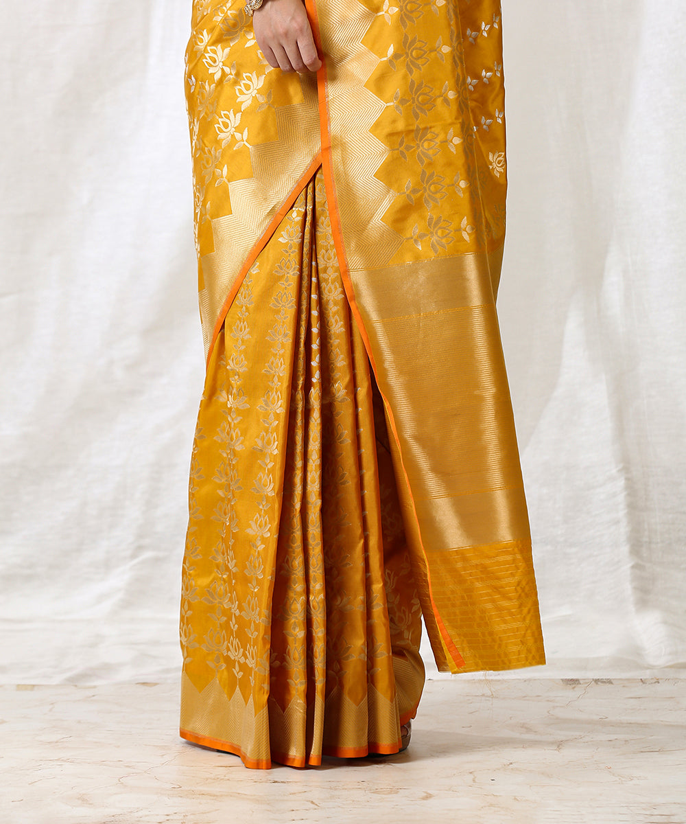 Handloom_Mustard_Pure_Katan_Silk_Banarasi_Saree_With_Lotus_Motifs_Woven_Vertically_WeaverStory_04