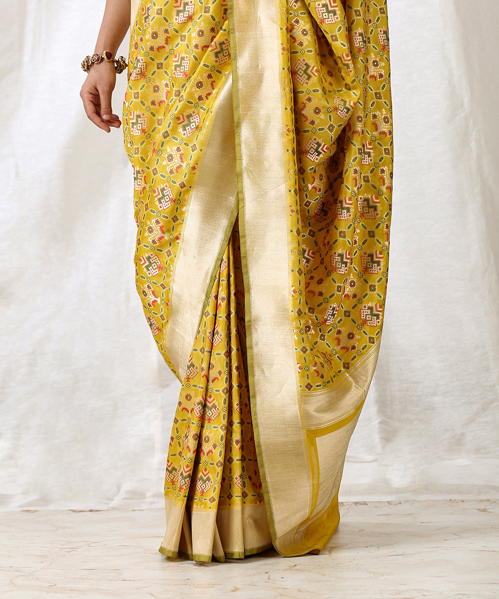 Yellow_Handloom_Pure_Katan_Silk_Patola_Saree_With_Zari_Border_WeaverStory_04
