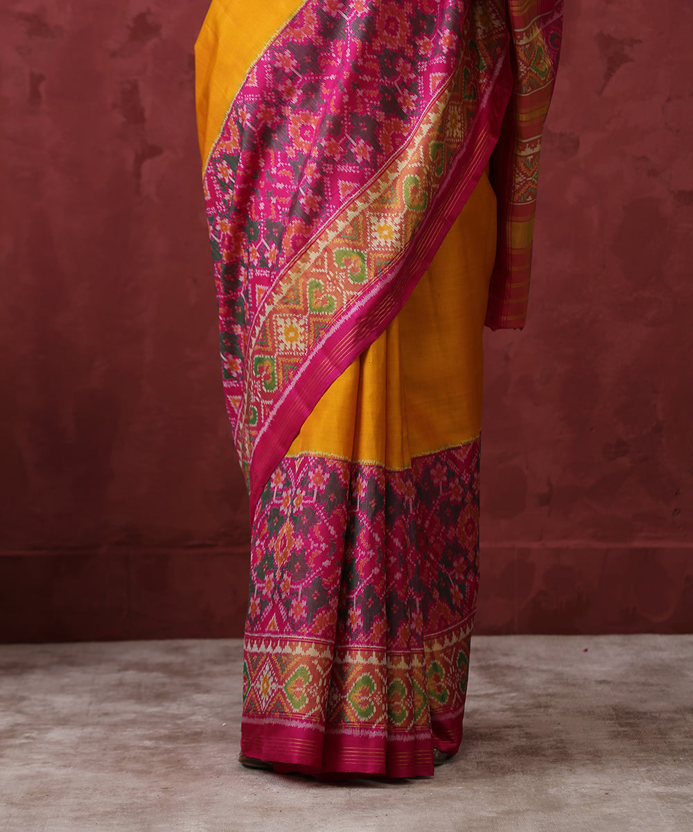 Mustard_Handloom_Mulberry_Silk_Patola_Saree_With_Pink_Border_WeaverStory_04