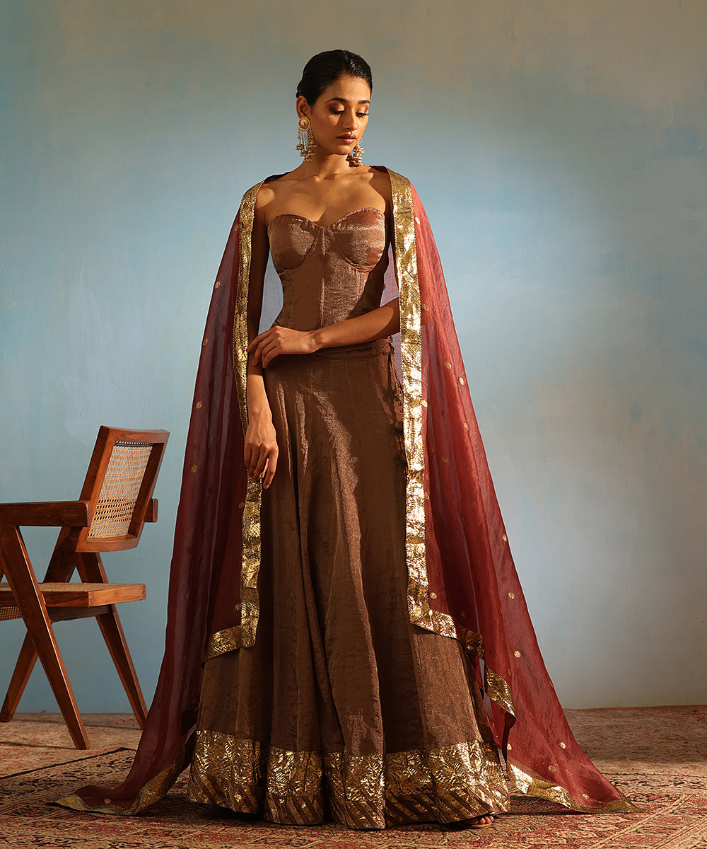 SAND BROWN RAW SILK BRALETTE PAIRED WITH COTTON SILK LEHENGA AND ORGAN