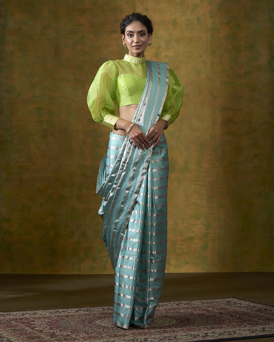 Turquoise_Blue_Handloom_Pure_Satin_Silk_Saree_with_Silver_Zari_Stripes_WeaverStory_02