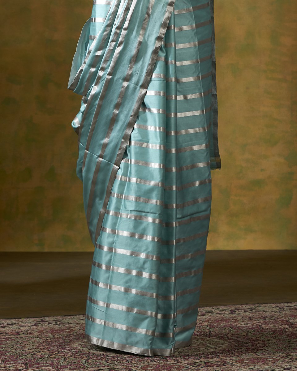 Turquoise_Blue_Handloom_Pure_Satin_Silk_Saree_with_Silver_Zari_Stripes_WeaverStory_04